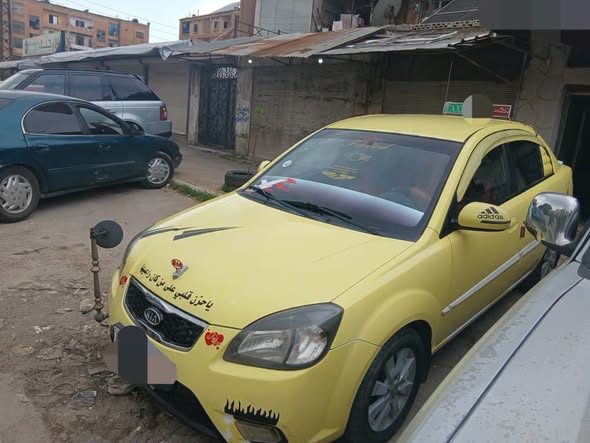 كيا ريو 2011 - صورة 3