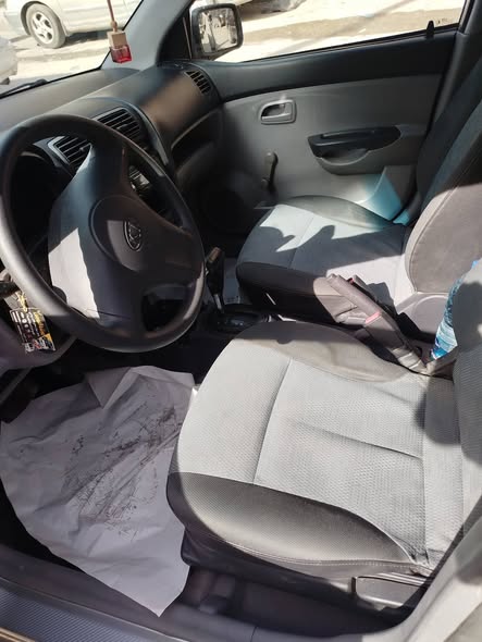 كيا مورنيغ 2006 - صورة 3