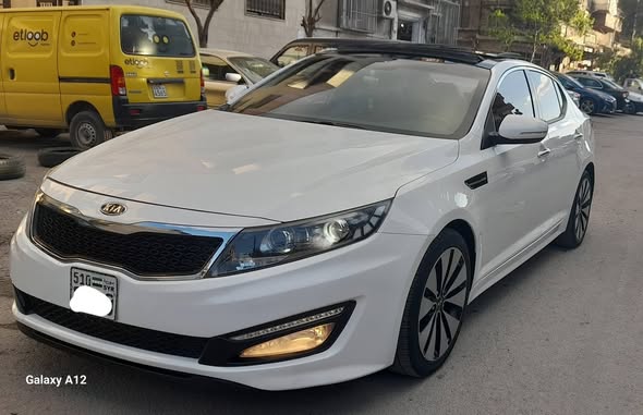 كيا أوبتيما 2011 - صورة 3