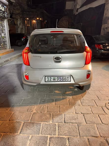 كيا مورنيغ 2013 - صورة 2