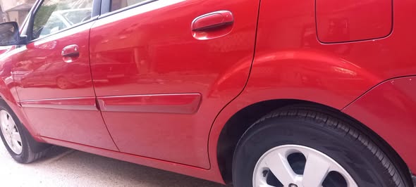 كيا ريو 2010 - صورة 4