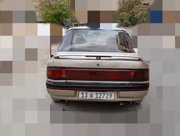 مازدا 323 1993 - صورة 5
