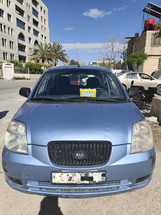 كيا مورنيغ 2006