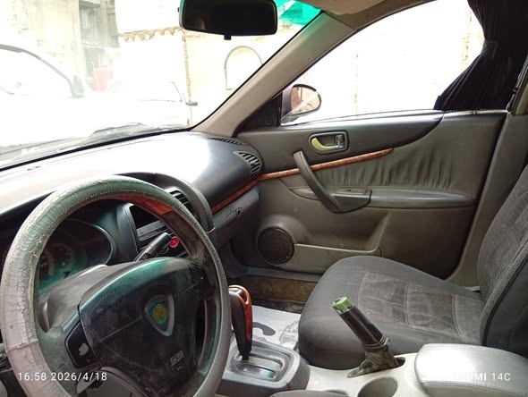 بروتون واجا 2005 - صورة 5