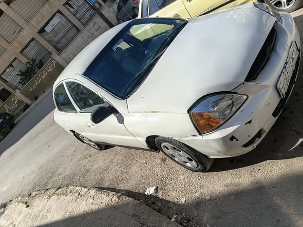 كيا ريو 2002 - صورة 2