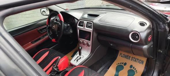 سوبارو أمبريزا 2006 - صورة 2