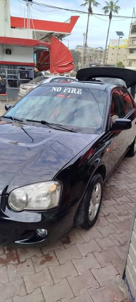 سوبارو أمبريزا 2006 - صورة 5