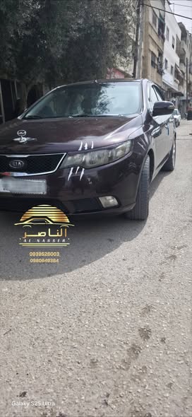 كيا فورتي 2011 - صورة 1