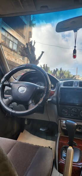 مازدا 323 2004 - صورة 2