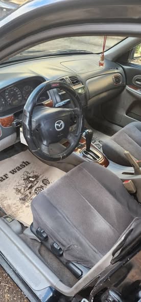 مازدا 323 2004 - صورة 3
