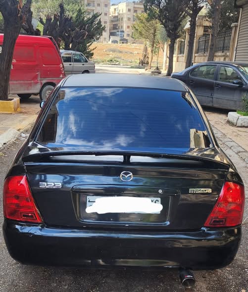 مازدا 323 2004 - صورة 4