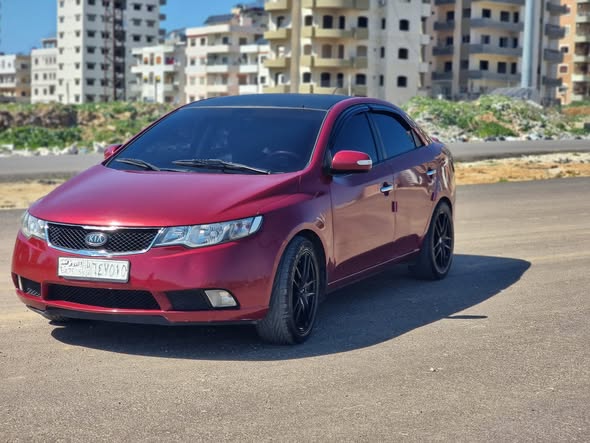 كيا فورتي 2009 - صورة 2