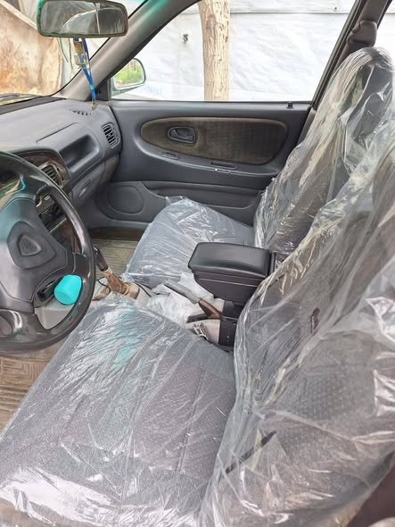 بروتون ويرا 2001 - صورة 1