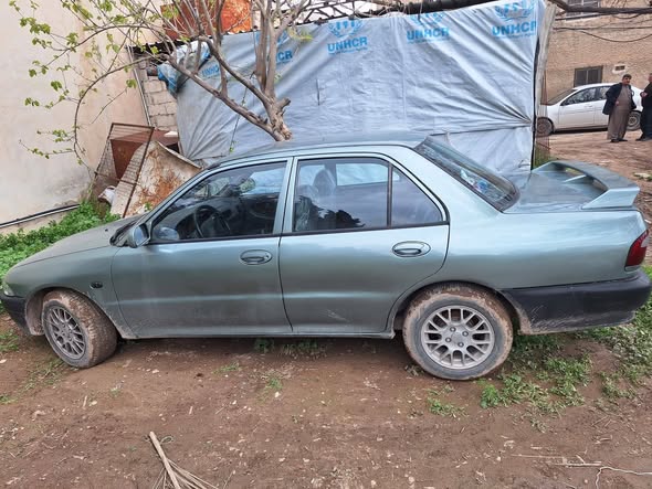 بروتون ويرا 2001 - صورة 2