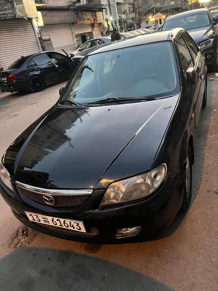 ماذدا 323 2001 - صورة 4