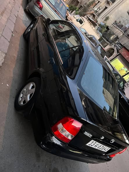 ماذدا 323 2001 - صورة 5