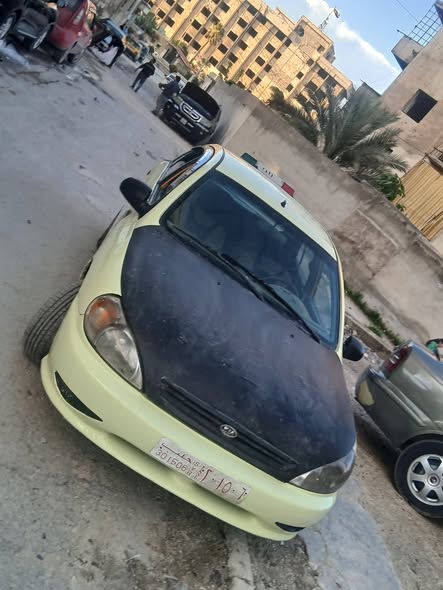 كيا ريو 2002 - صورة 2