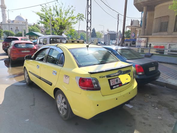 كيا ريو 2011 - صورة 1