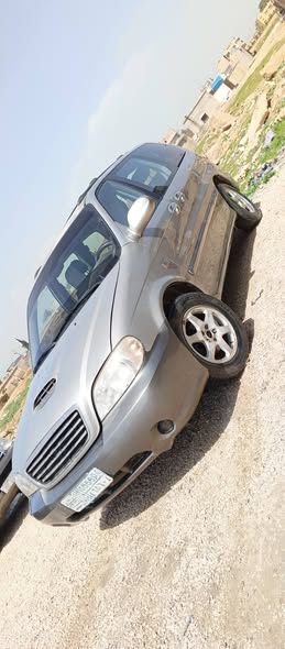 كيا كرنفال 2004 - صورة 2