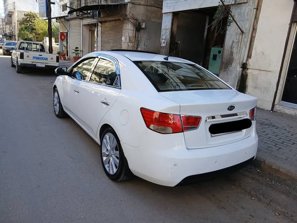 كيا فورتي 2010 - صورة 2