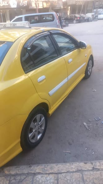 كيا ريو 2010 - صورة 2