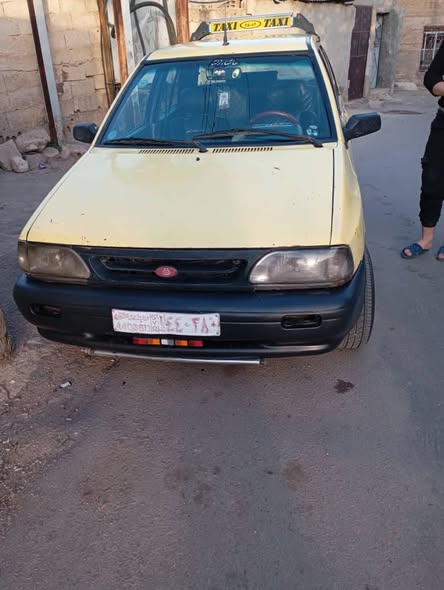 كيا ريو 2011 - صورة 1