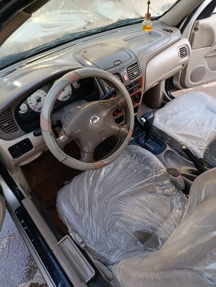 نيسان صني 2003 - صورة 3