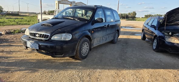 كيا كرنفال 2001 - صورة 5