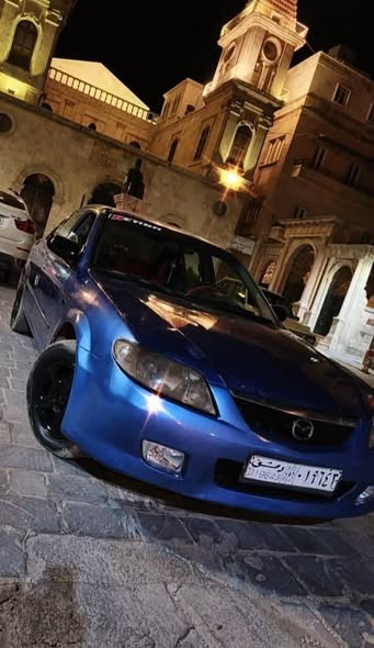 مازدا 323 2003 - صورة 4