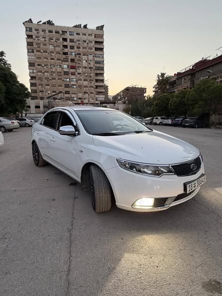 كيا فورتي 2012 - صورة 2