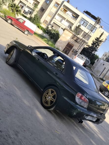 سوبارو امبريزا 2002 - صورة 2
