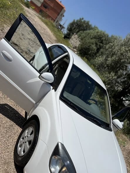 كيا ريو 2011 - صورة 4
