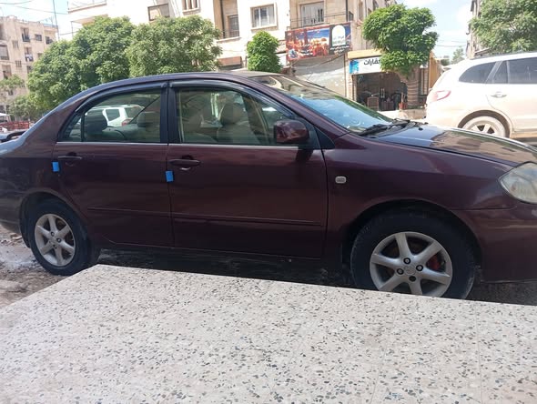 تويوتا كورولا 2005 - صورة 2
