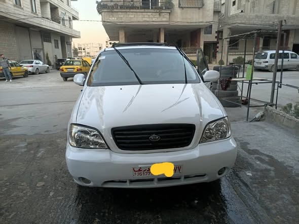 كيا كرنفال 2003 - صورة 2