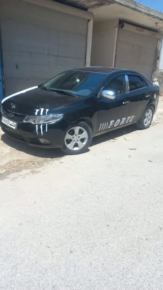 كيا فورتي 2011 - صورة 4