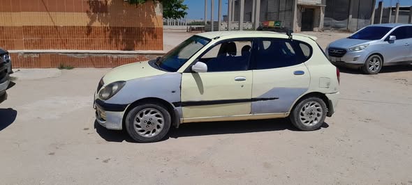 دايهاتسو سيريون 2004 - صورة 1