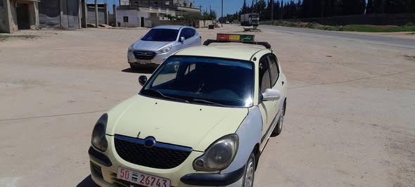 دايهاتسو سيريون 2004 - صورة 2