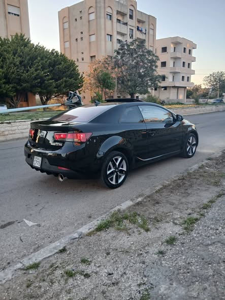 كيا فورتي 2011 - صورة 3