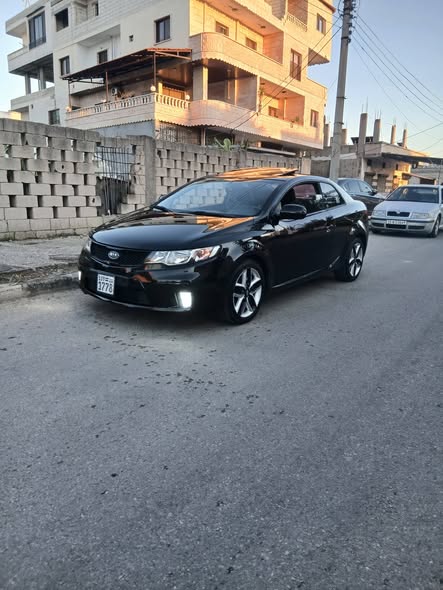 كيا فورتي 2011 - صورة 5