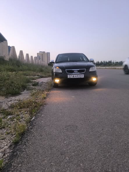 كيا ريو 2011 - صورة 2