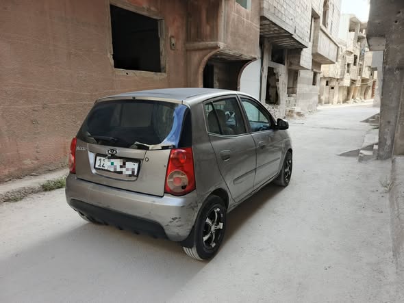كيا بيكانتو 2010 - صورة 1