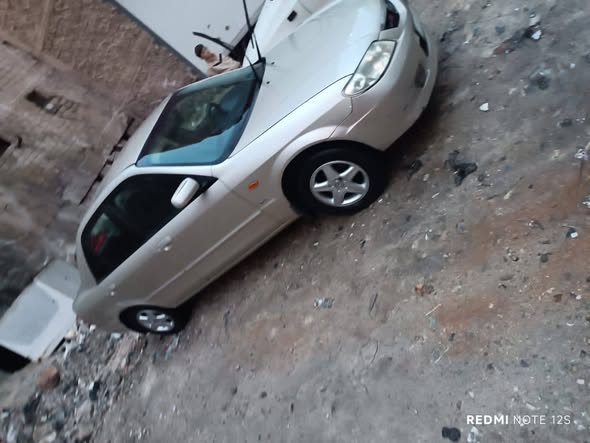 مازدا 323 2002 - صورة 1