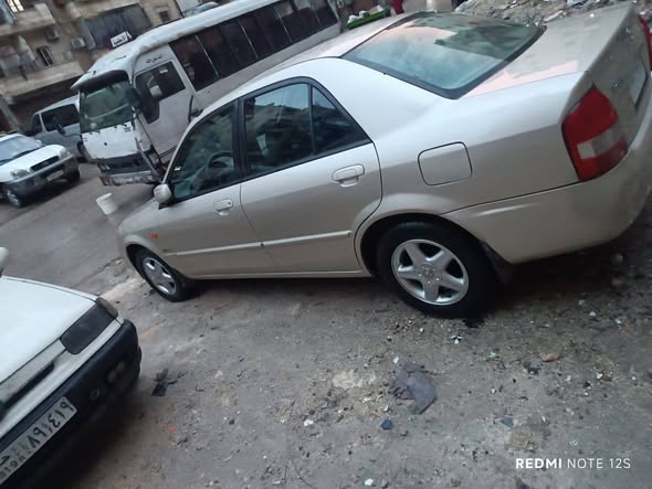 مازدا 323 2002 - صورة 2