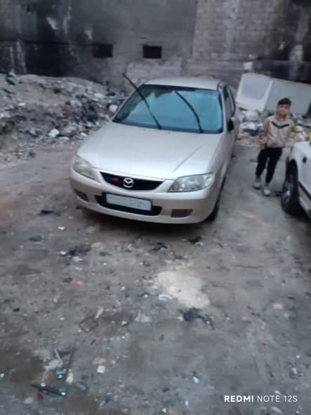 مازدا 323 2002 - صورة 3