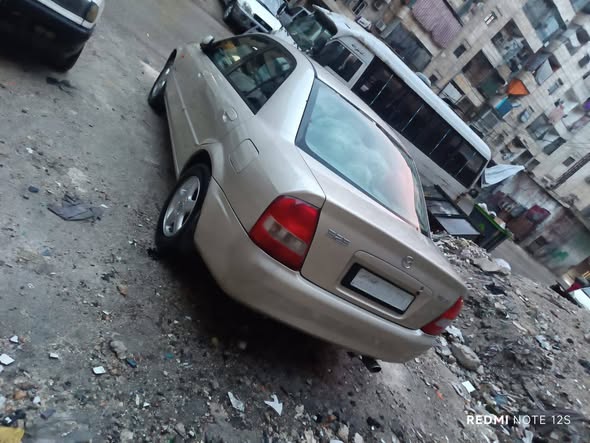 مازدا 323 2002 - صورة 4