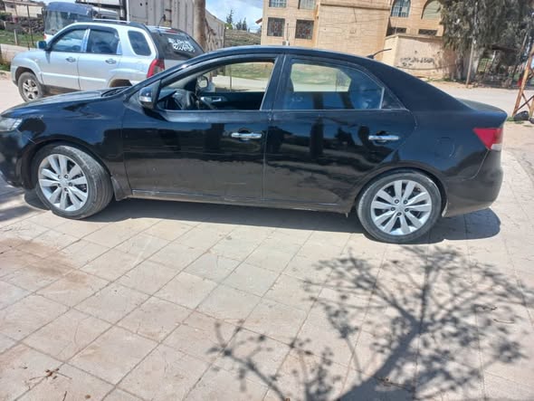 كيا فورتي 2010 - صورة 4