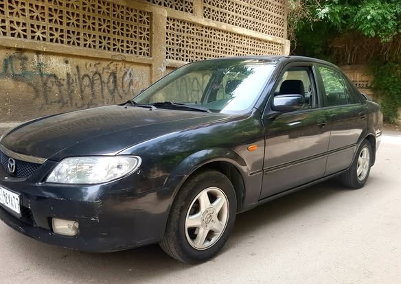مازدا 323 2002 - صورة 1