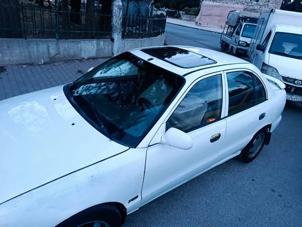 هيونداي اكسنت 1995 - صورة 1