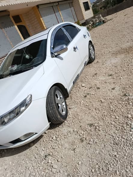 كيا سيراتو 2011 - صورة 3