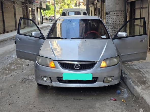مازدا 323 2001 - صورة 1